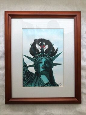 “Cat on the Statue of Liberty” Framed Print